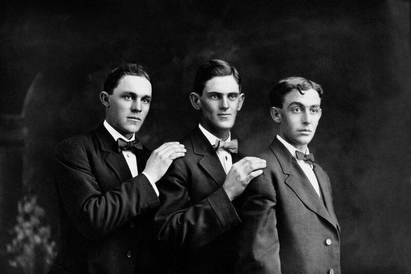 Three men in formal suits