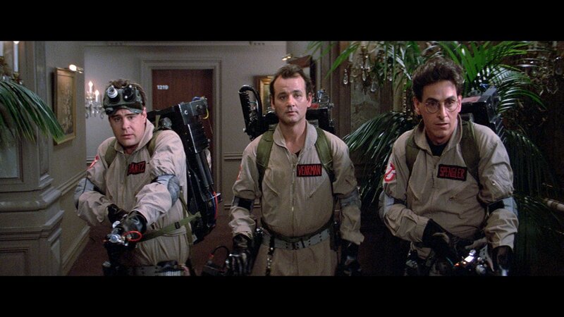 Three Men in Ghostbuster Suits — Beige