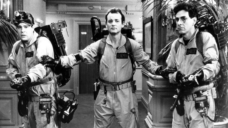 Three Men in Ghostbuster Suits — Black, Dramatic