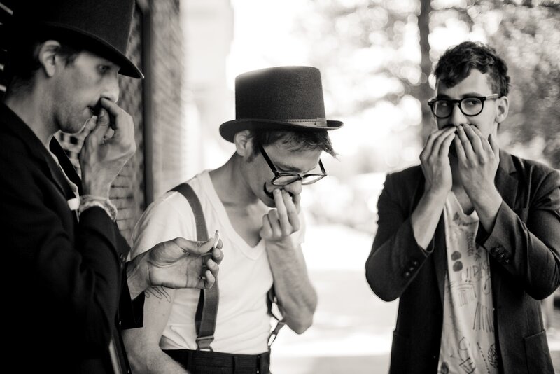 Three Men in Hats — Black