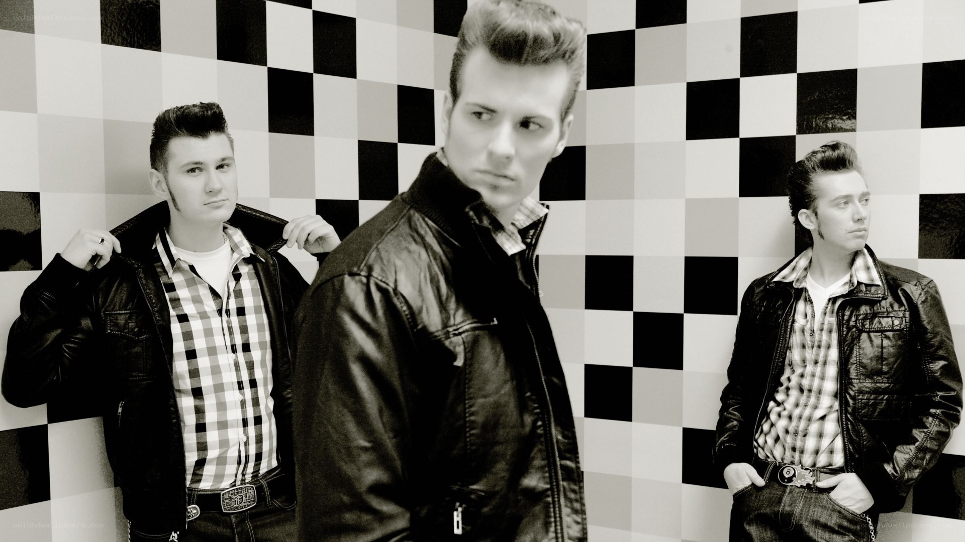 three men in leather jackets