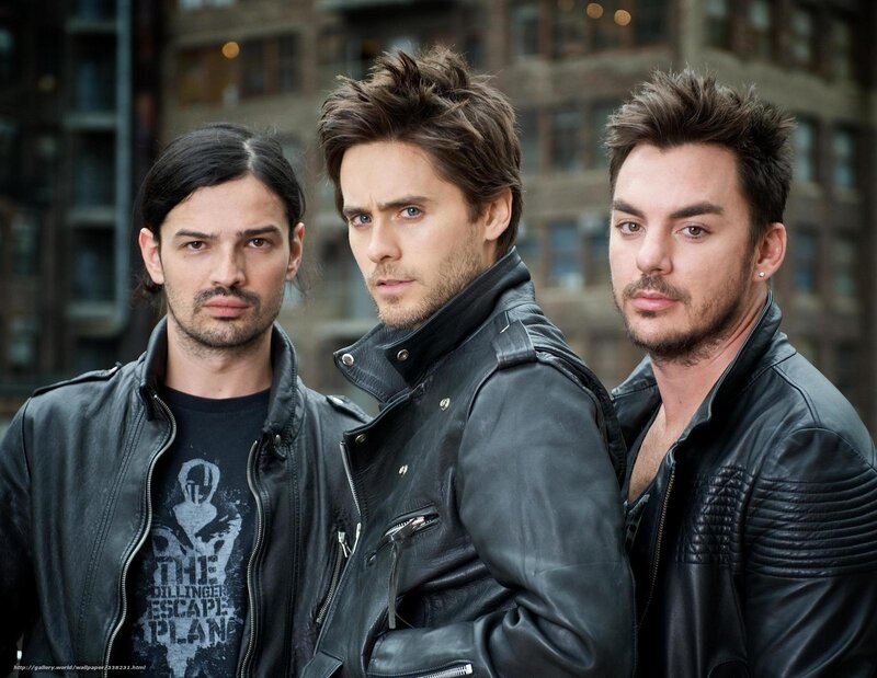 three men in leather jackets