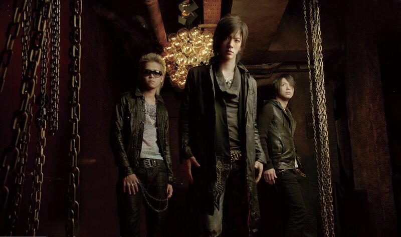 Three Men in Leather Jackets — Black, Dramatic, Photograph, Chains
