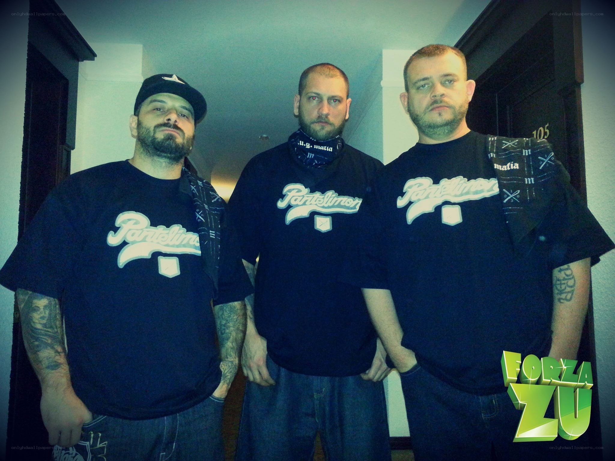 three men in matching shirts