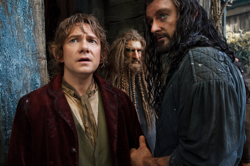 Three Men in Medieval Clothing