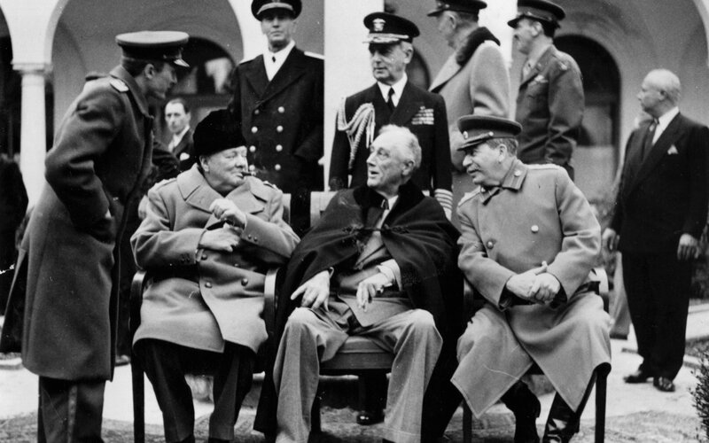 Three Men in Military Coats