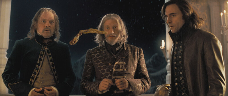 Three men in period clothing