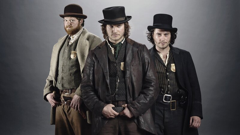 Three Men in Period Clothing — Black