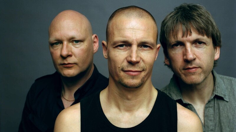Three Men in Studio — Gray