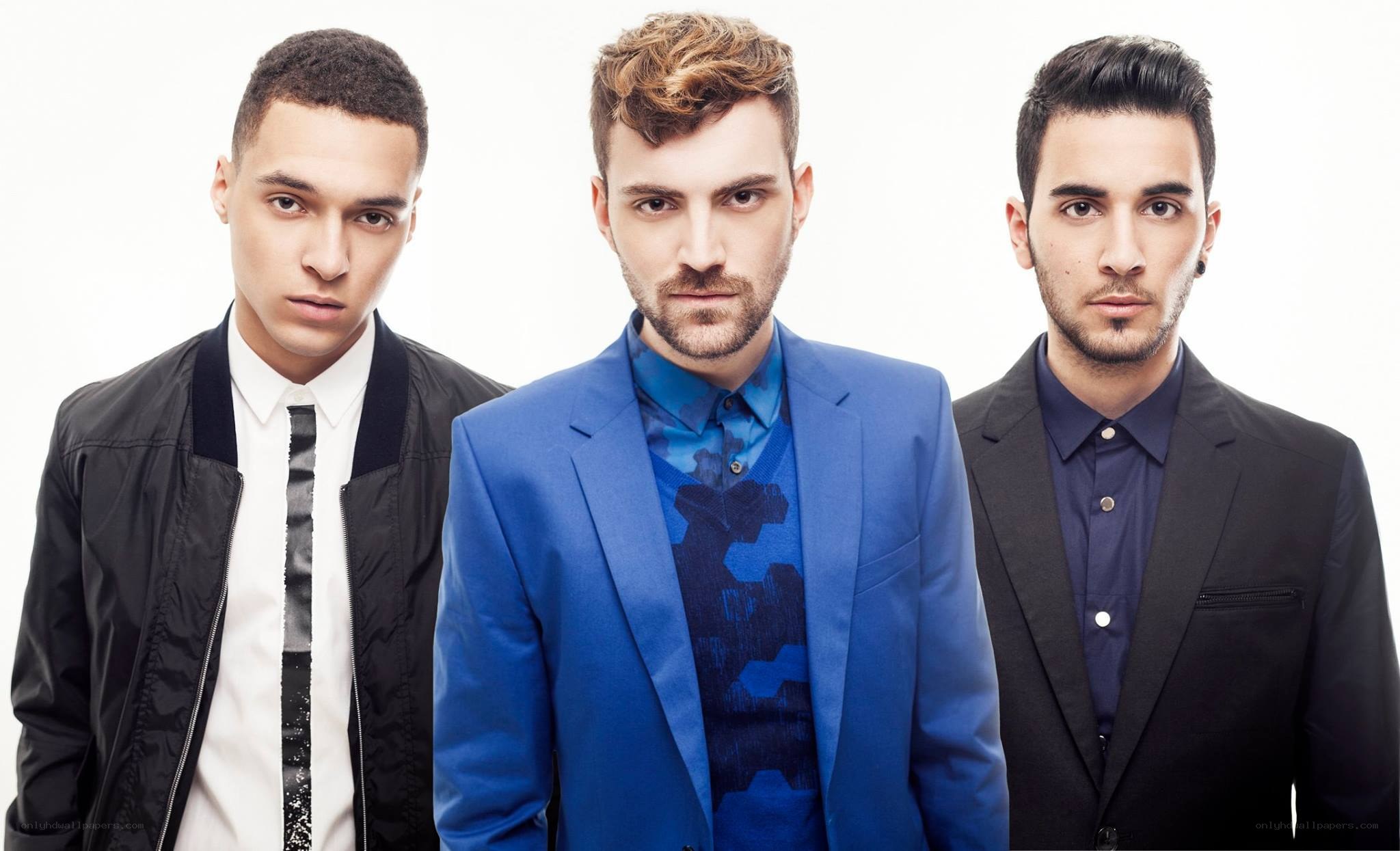 three men in stylish suits