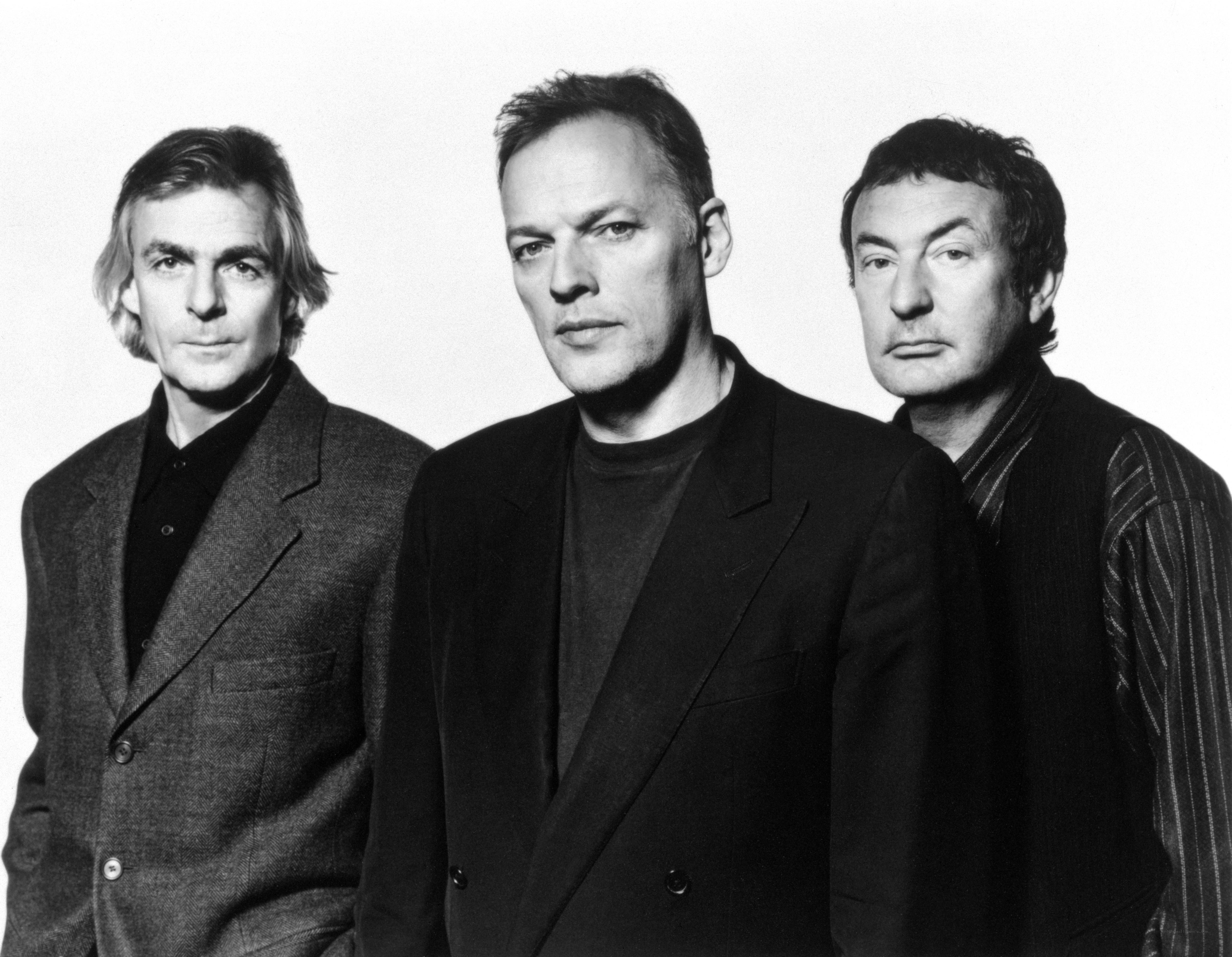 three men in suits