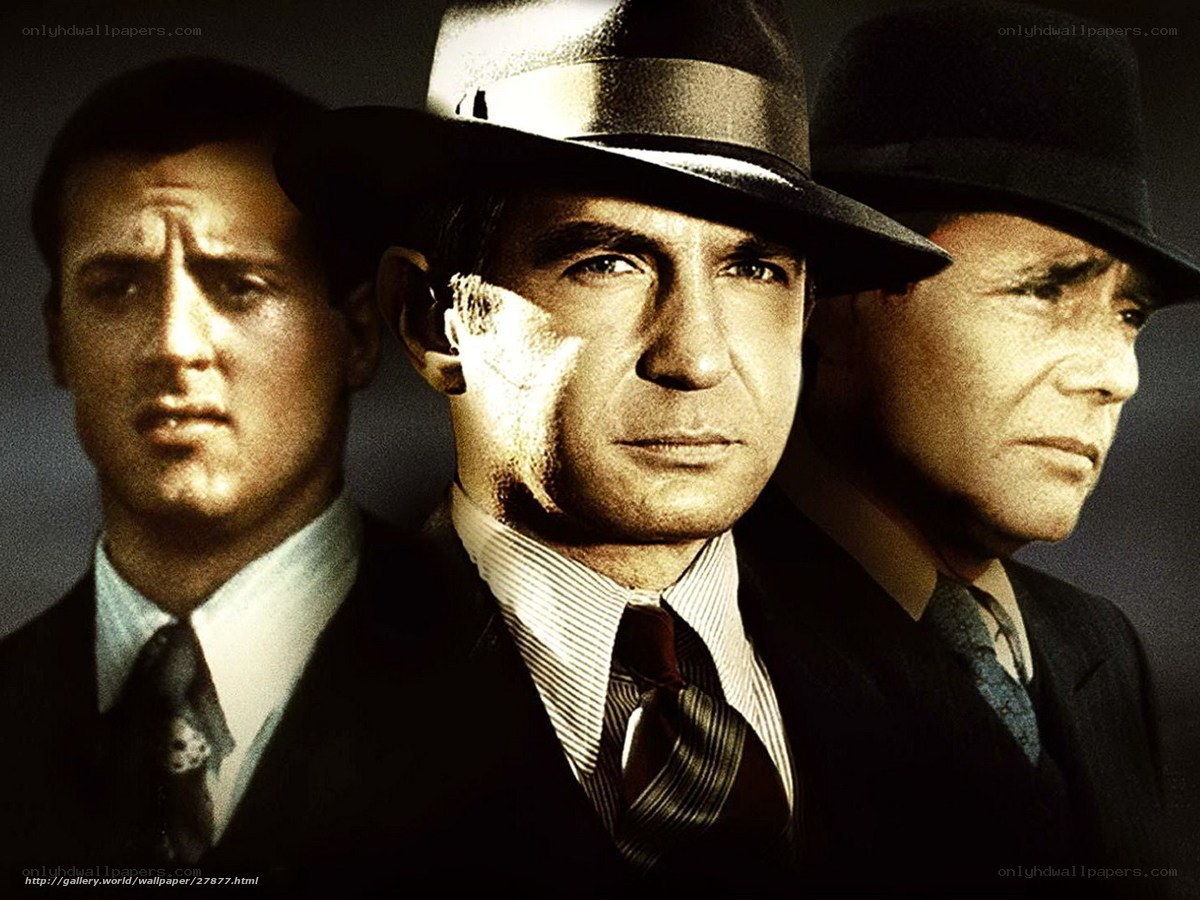 Three men in suits and hats