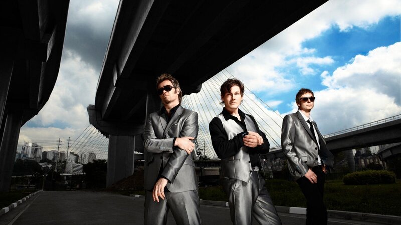 Three Men in Suits — Gray, Dramatic, Afternoon