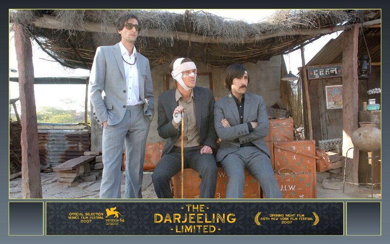 Three Men in Suits — Gray, Dramatic
