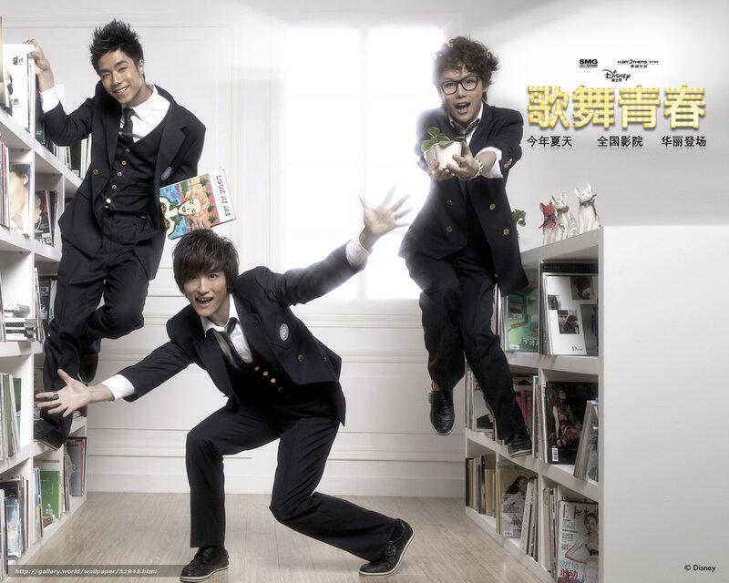 three men in suits in library