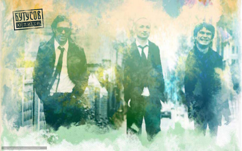 three men in suits on a colorful background