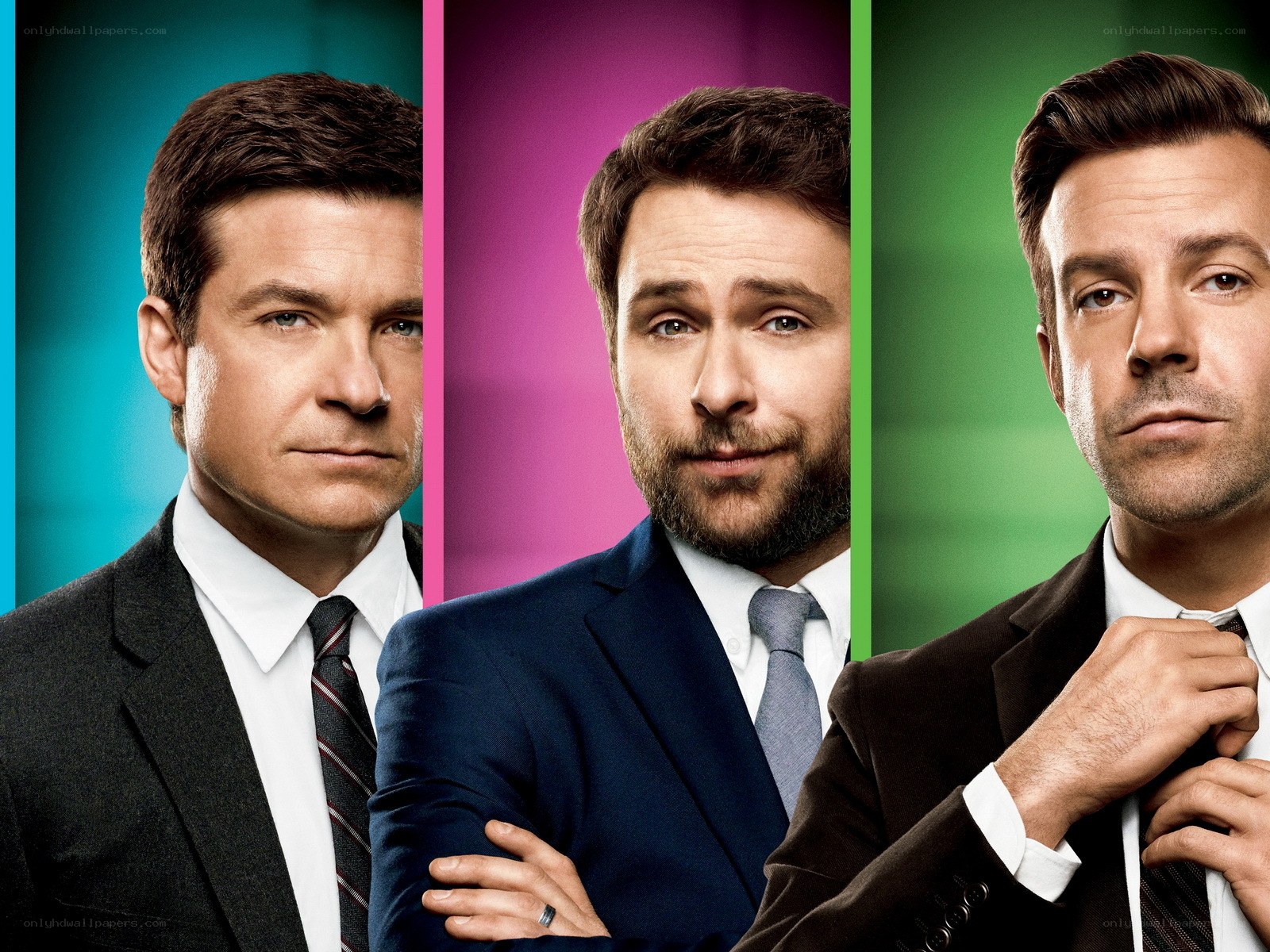 three men in suits promotional poster
