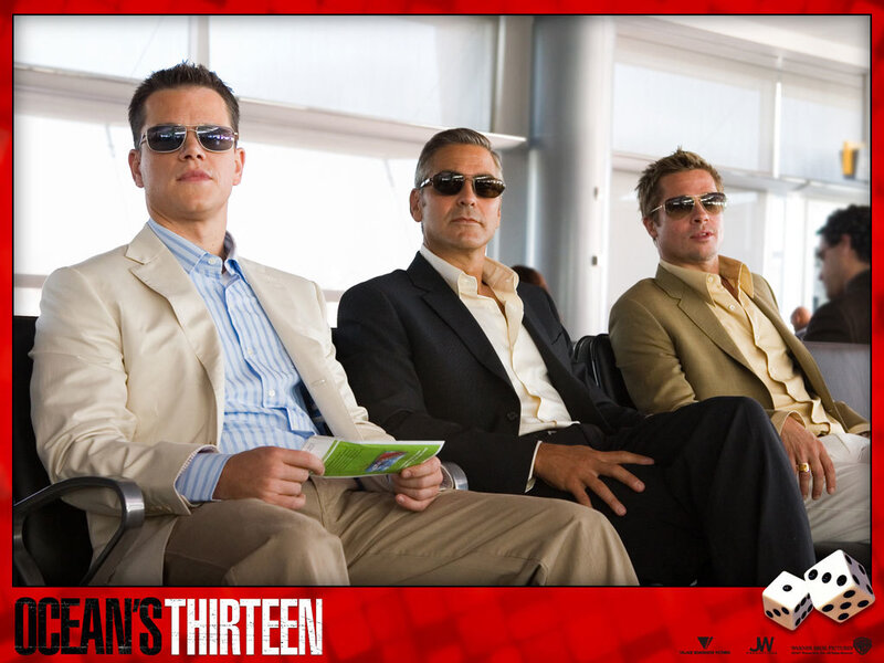 Three Men in Suits — Red, Serious