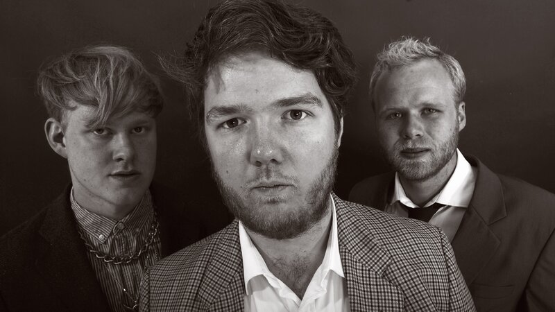 three men in suits