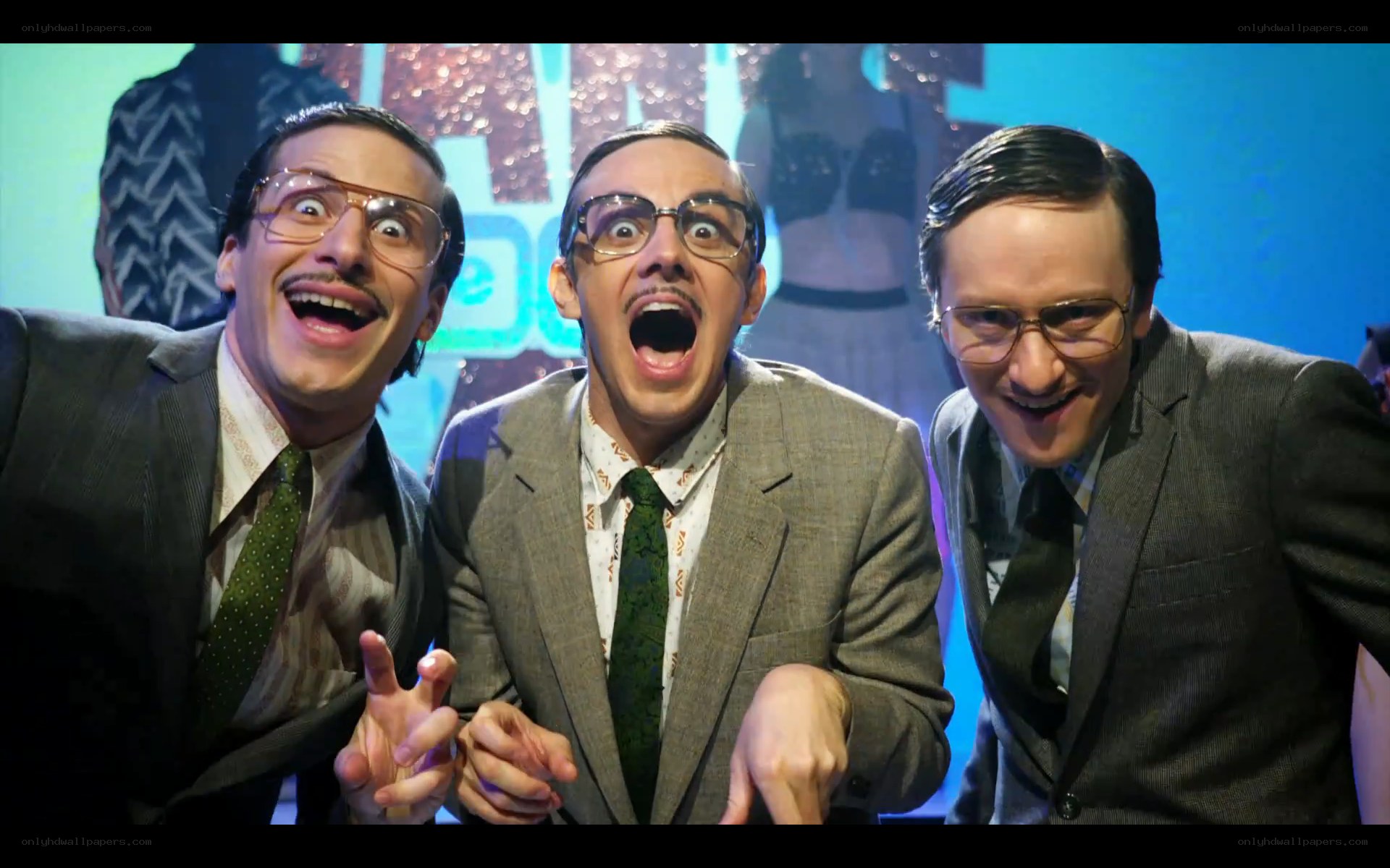 three men in suits with surprised expressions