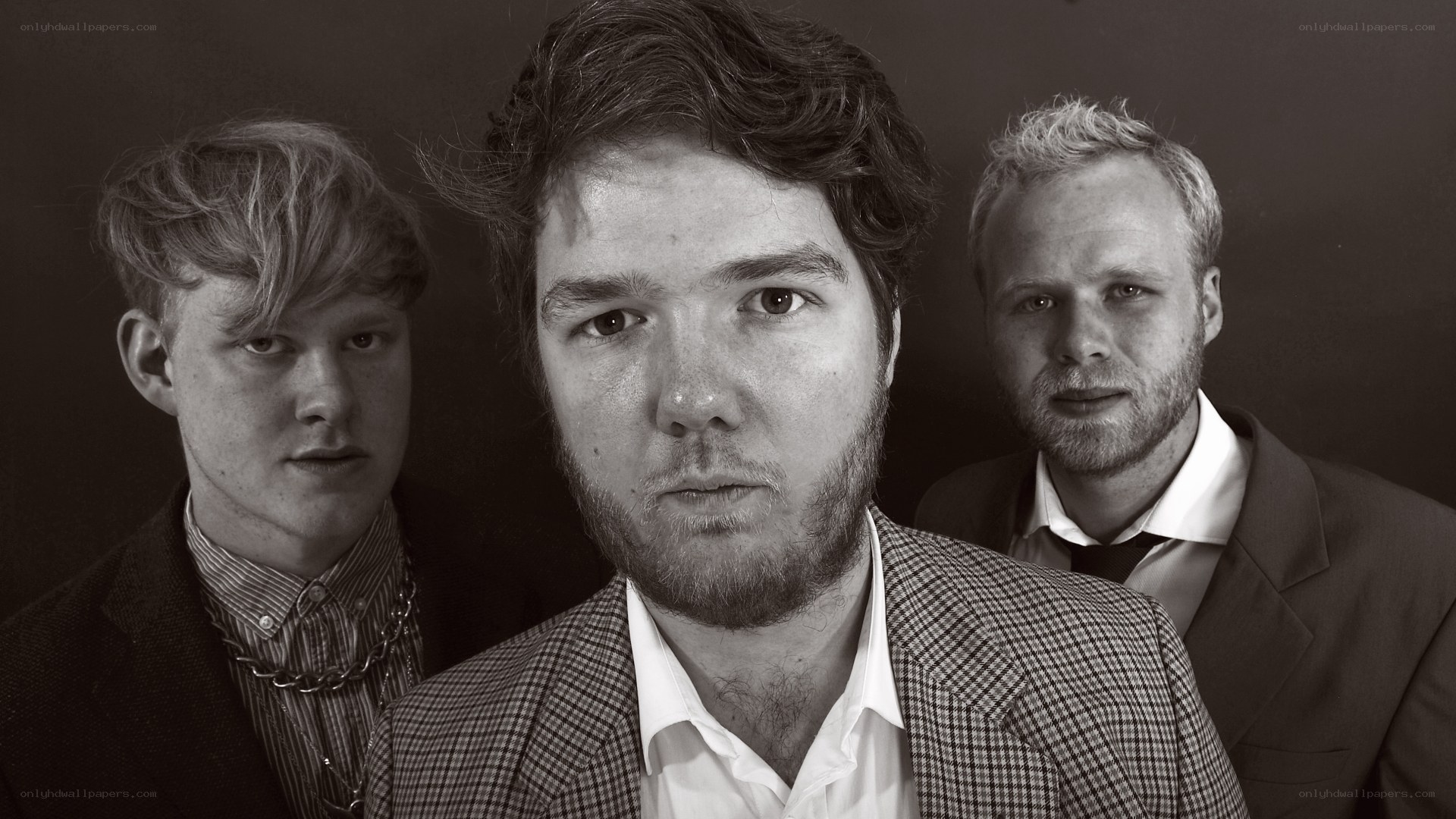 three men in suits