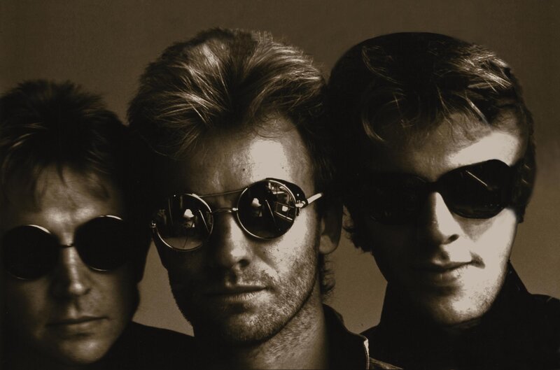 three men in sunglasses