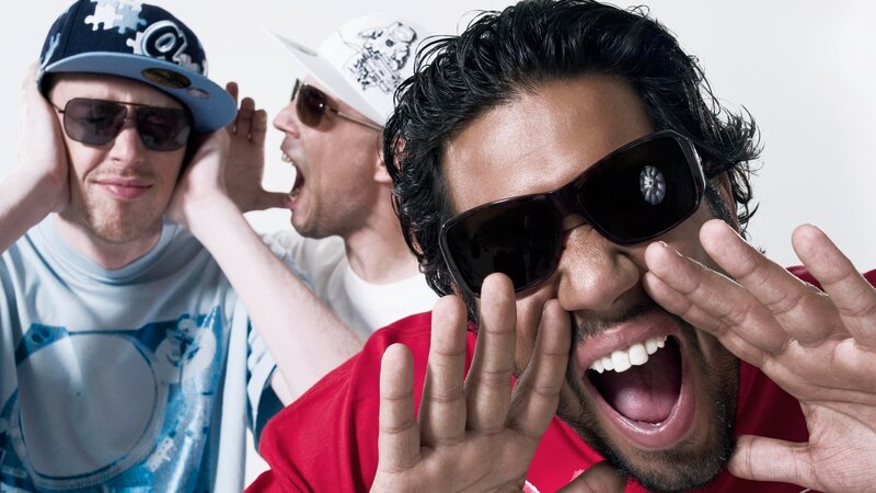 three men in sunglasses posing
