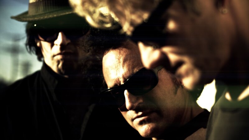 three men in sunglasses