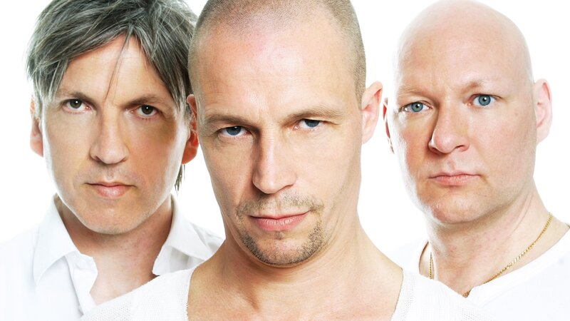 Three Men in White Shirts — Serious