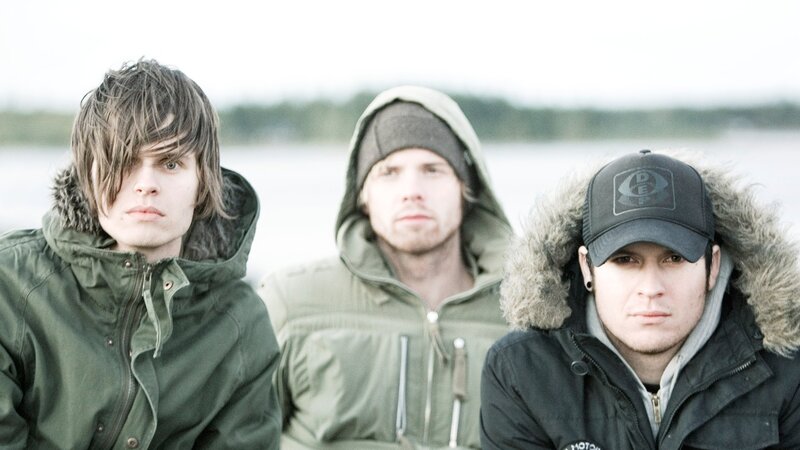 Three Men in Winter Coats — Green
