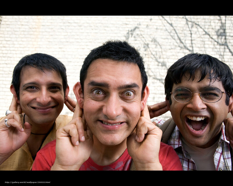 Three men making funny faces