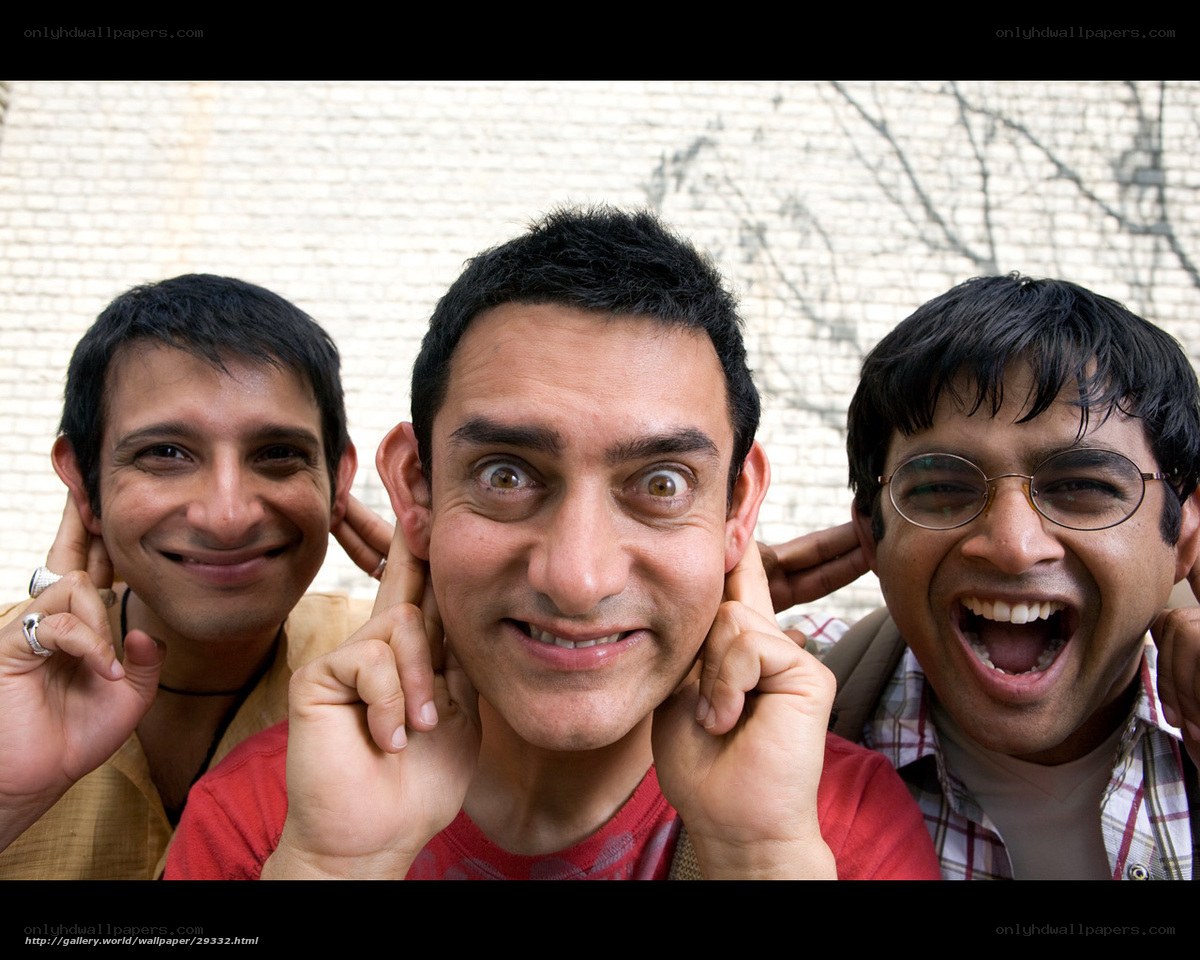Three men making funny faces