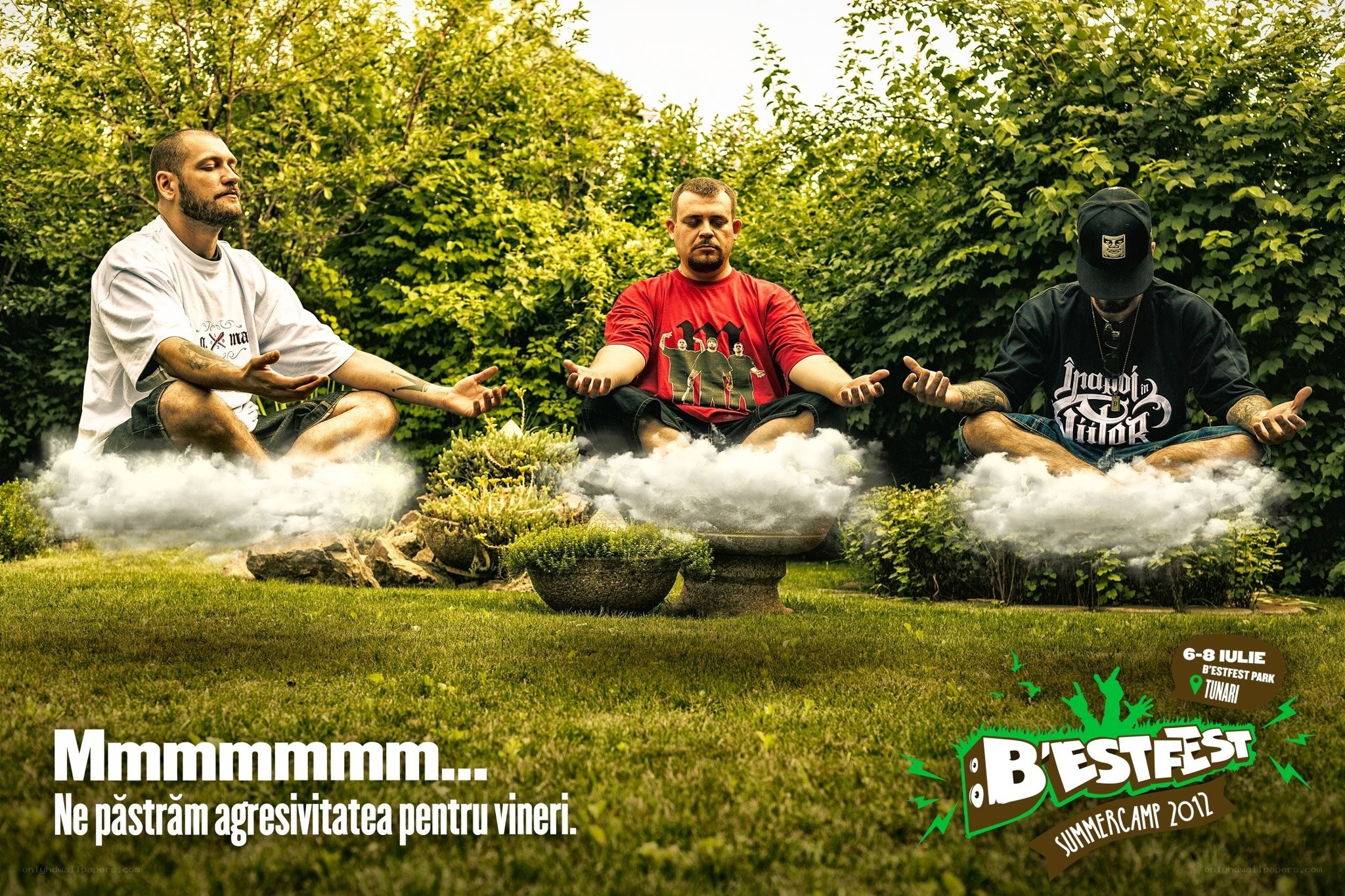Three men meditating in a garden