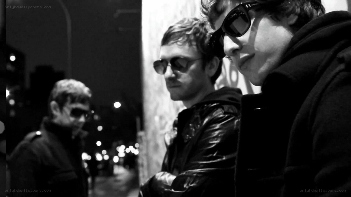 three men on a city street