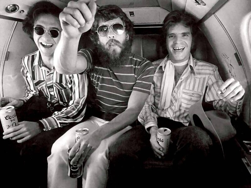 Three men on a plane