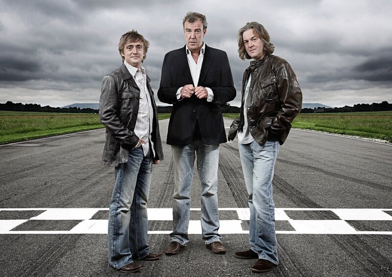 Three men on a racetrack