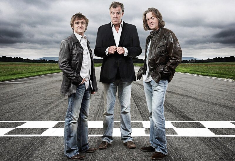 Three men on a racetrack