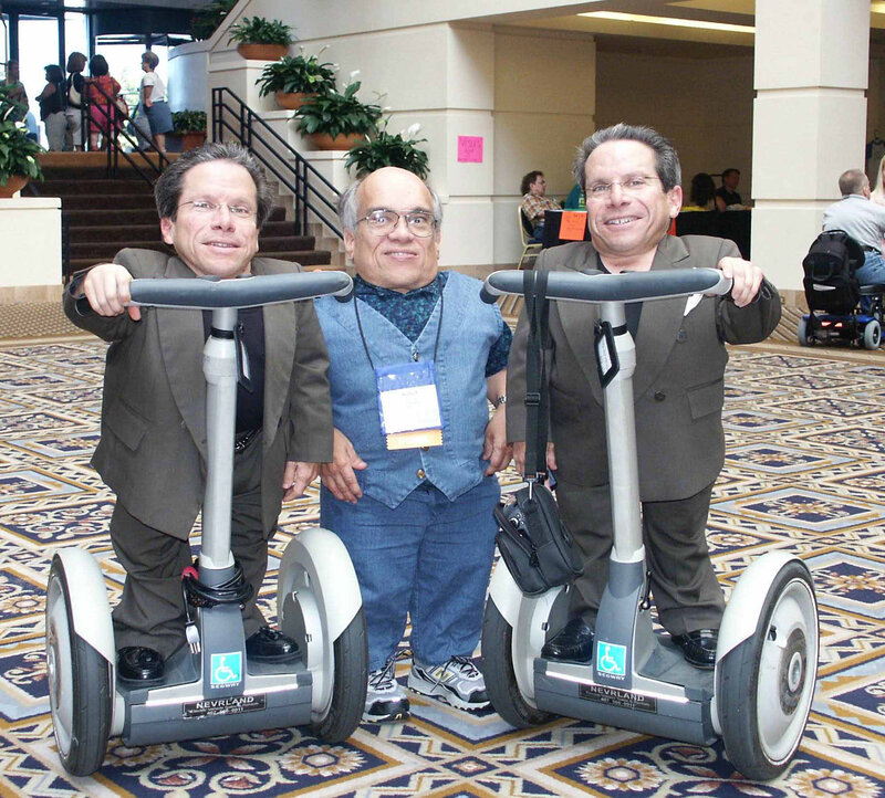 Three men on segways