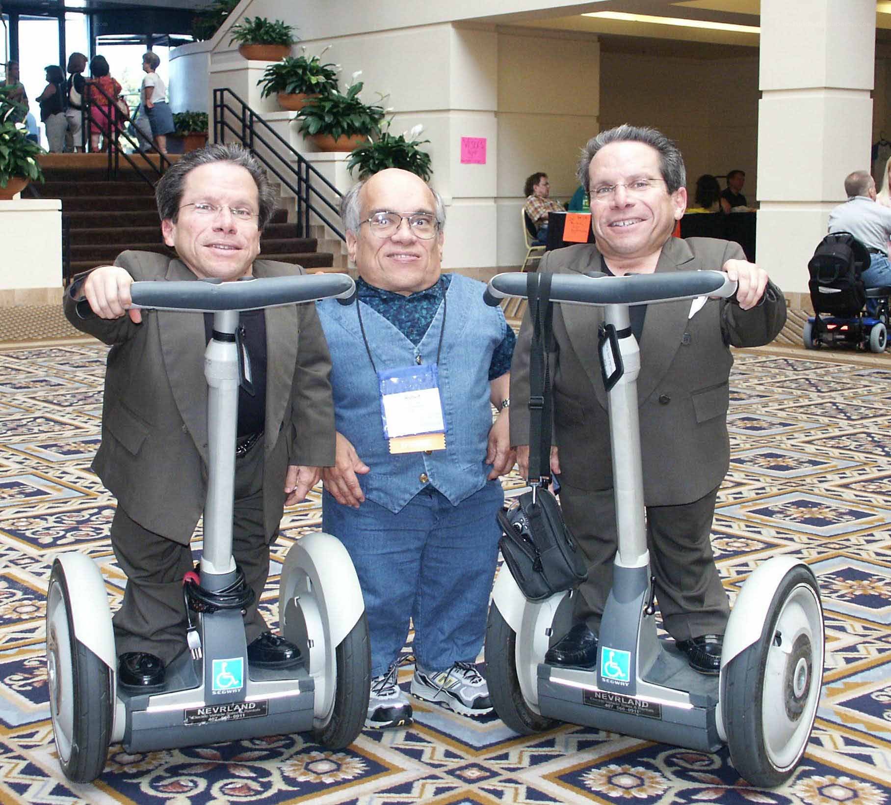 Three men on segways