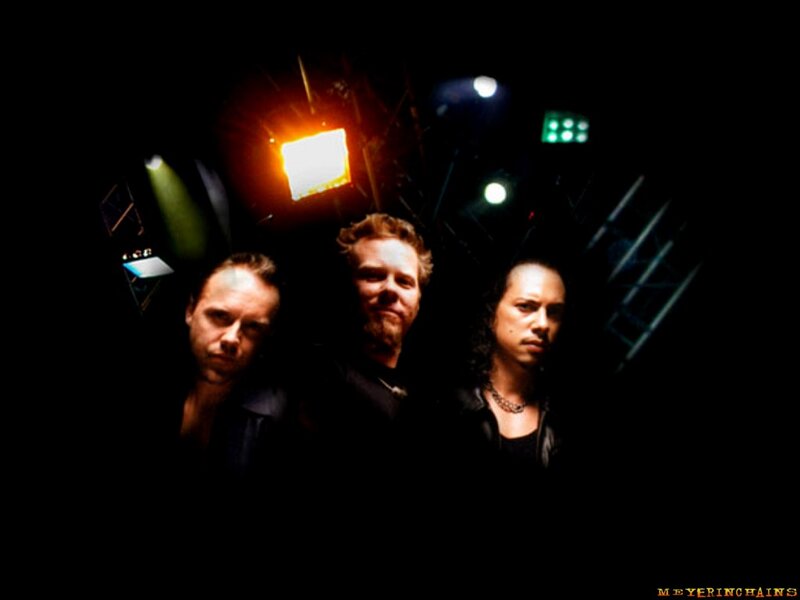 Three Men on Stage — Black, Dramatic