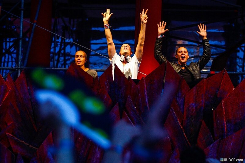 Three Men on Stage — Red