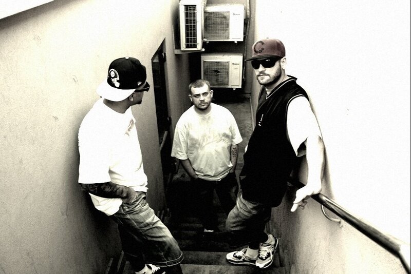 Three Men on Stairs