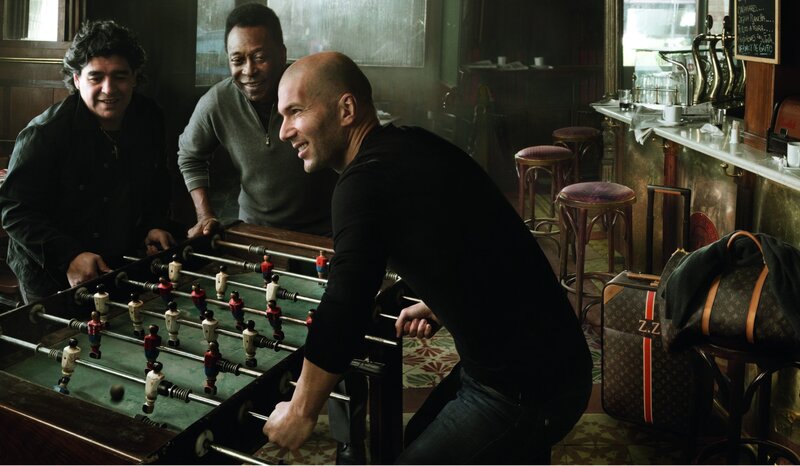 Three Men Playing Foosball — Black, Lighthearted