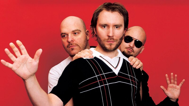 Three Men Posing — Red