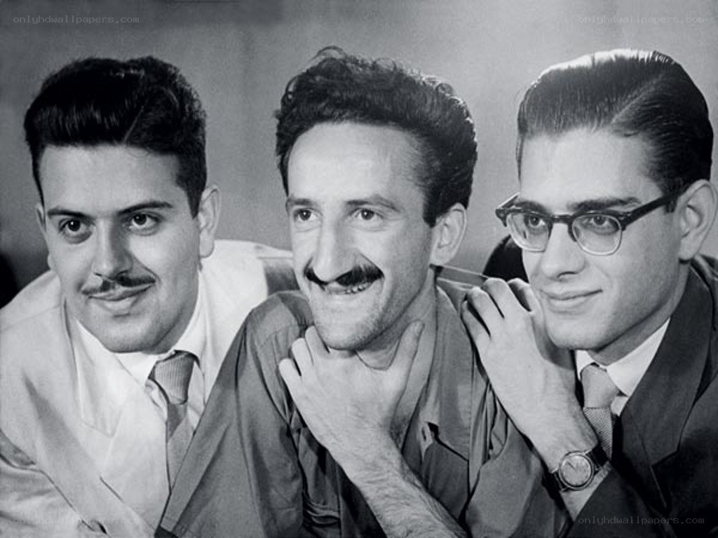 Three men posing together