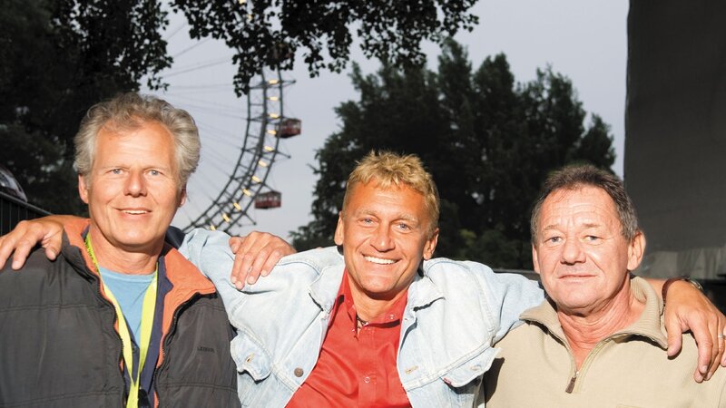 Three Men Posing Together — Blue, Friendly