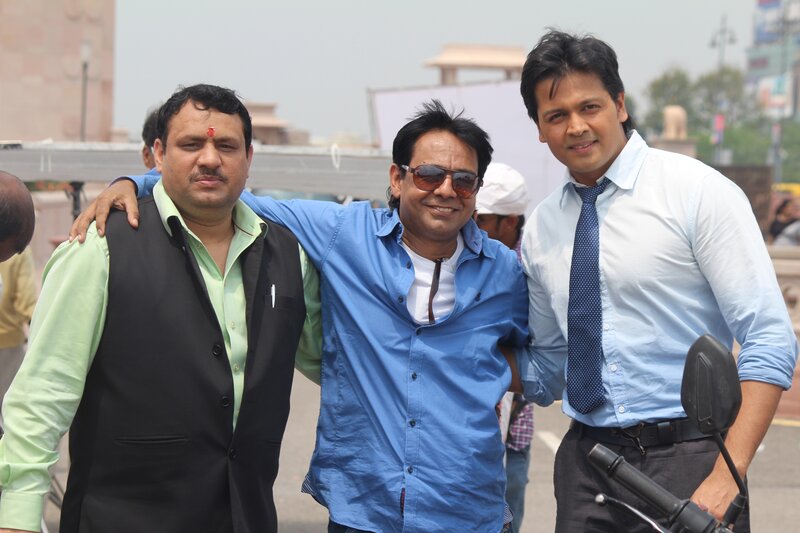 Three Men Posing Together — Blue