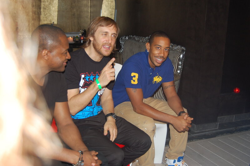 Three Men Sitting Together — Blue