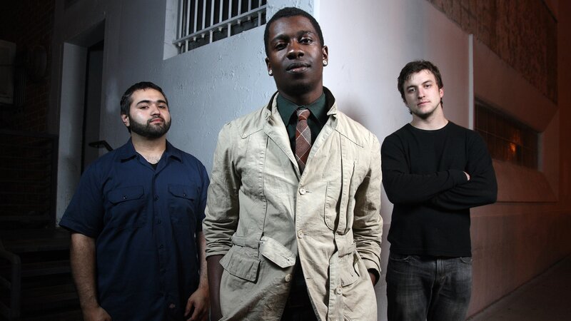 Three Men Standing — Beige