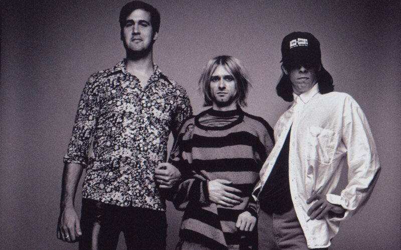 Three Men Standing — Black, Serious, Photograph, Band Members
